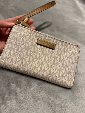 Michael Kors Beige Monogram Wristlet with Tan Strap